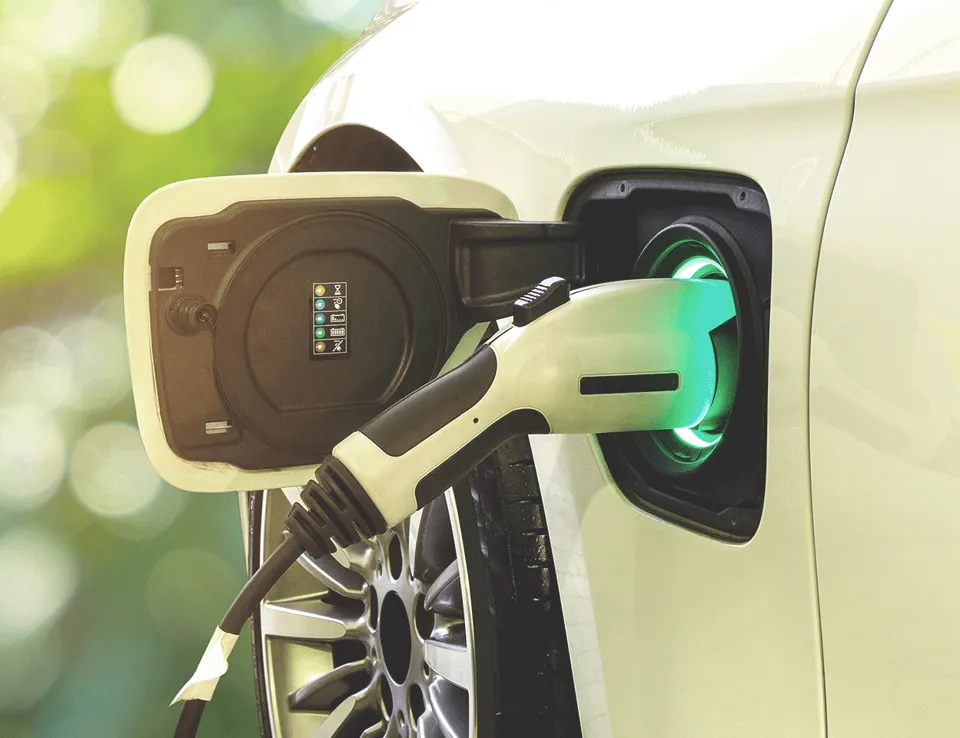 Electric Vehicle Charging Plugged In