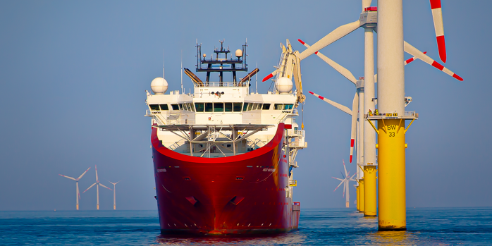 Maintenance ship docked at offshore windfarm