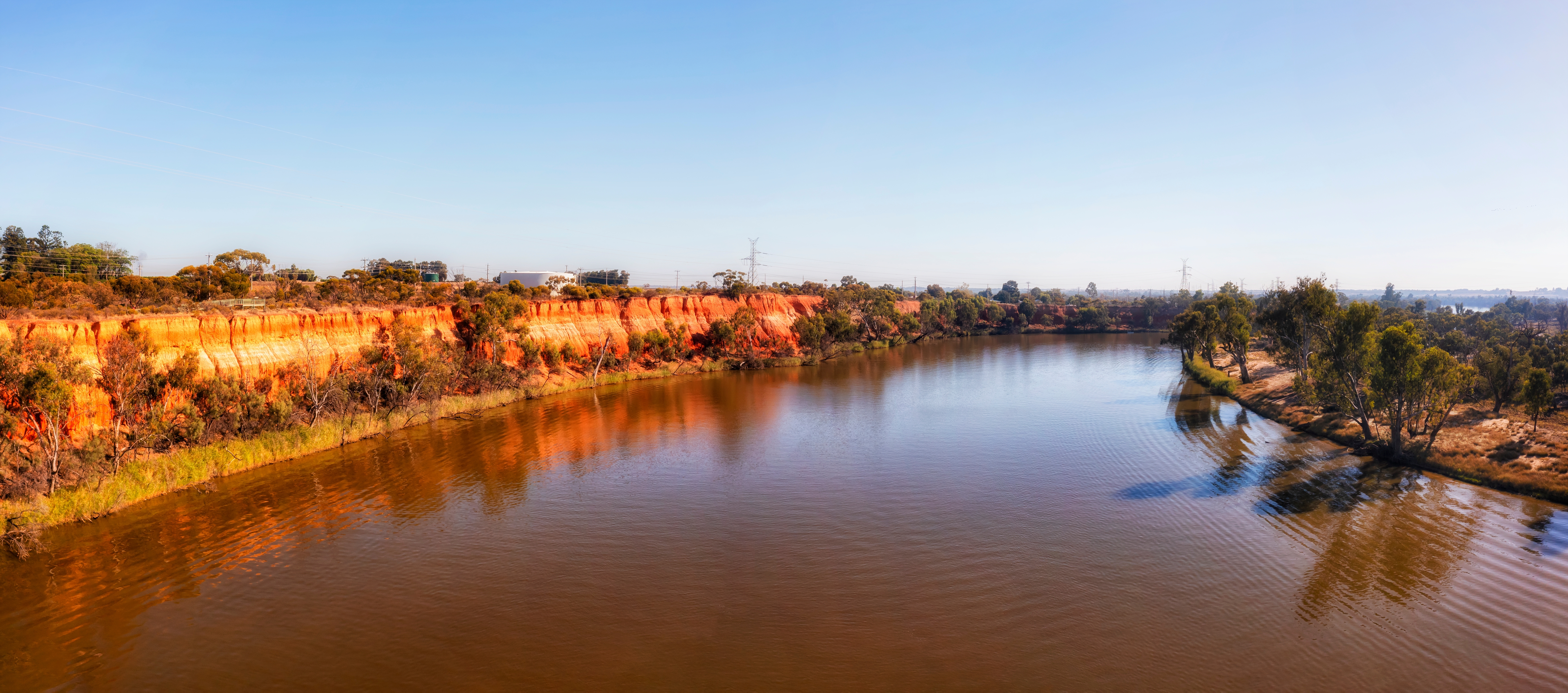 Scenic Red Cliffs Of Clay On Shores Of Murray River At Mildura Town On Victoria NSW Border Of Australia Aerial Panorama.
