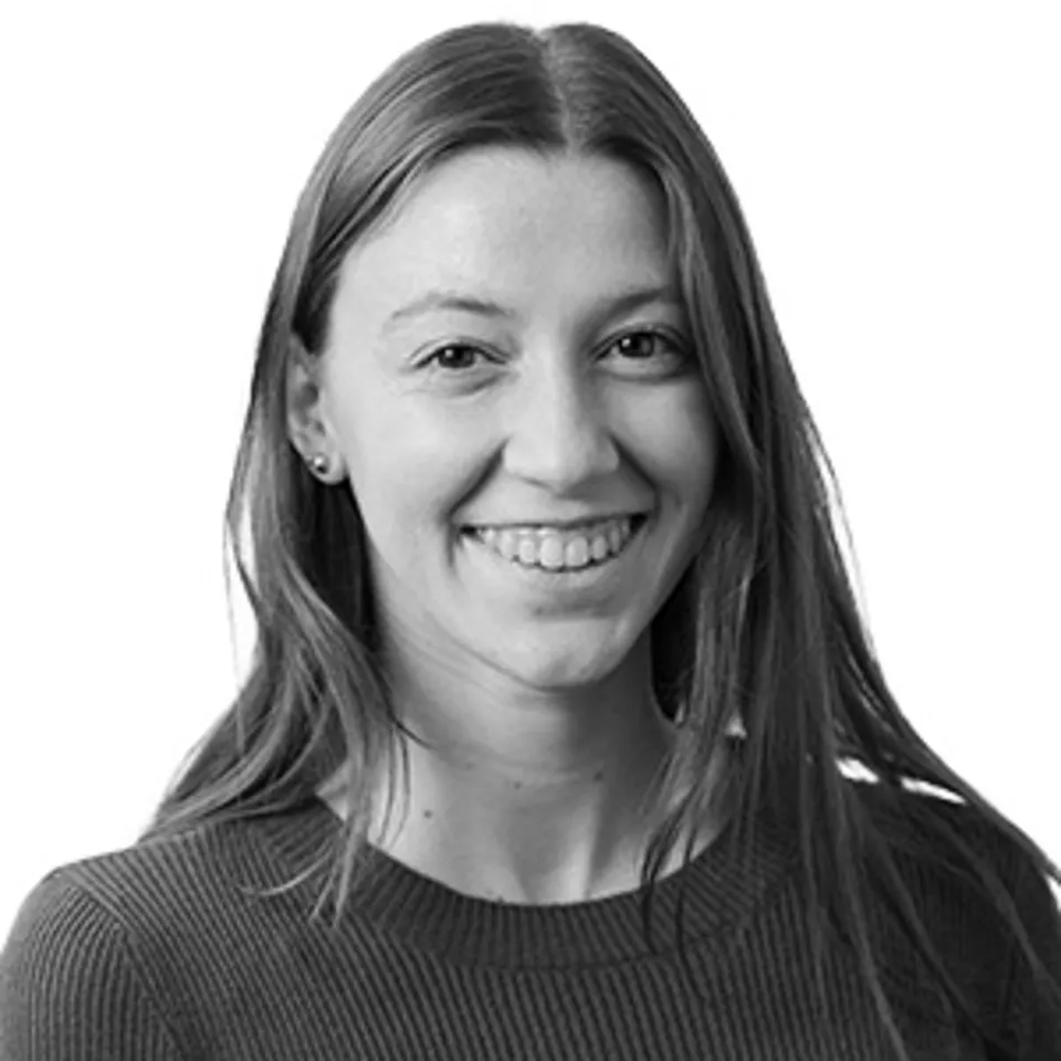 Karlie Travassaros Analyst