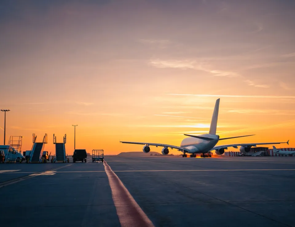 Airplane At An Airport Being Decarbonised And Supporting With Engineering