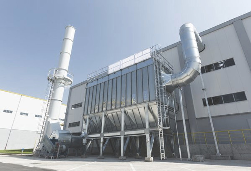 Industrial air filtering plant and emission stack