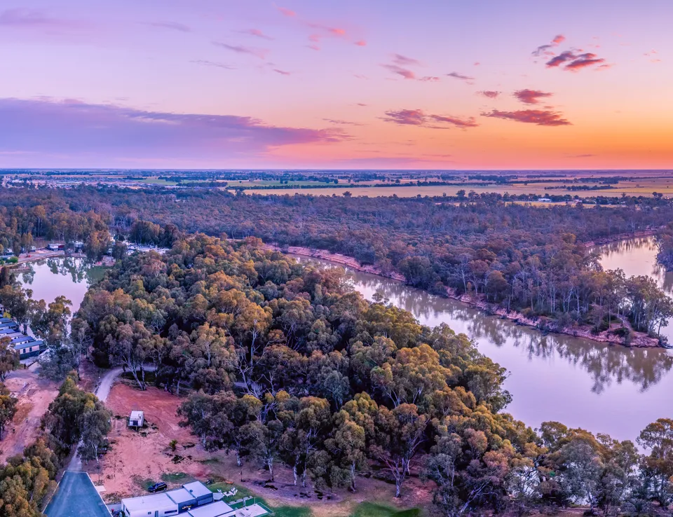 Aerial Panorama Of Murray River And Holiday Park At Sunset. Moama, New South Wales, Australia