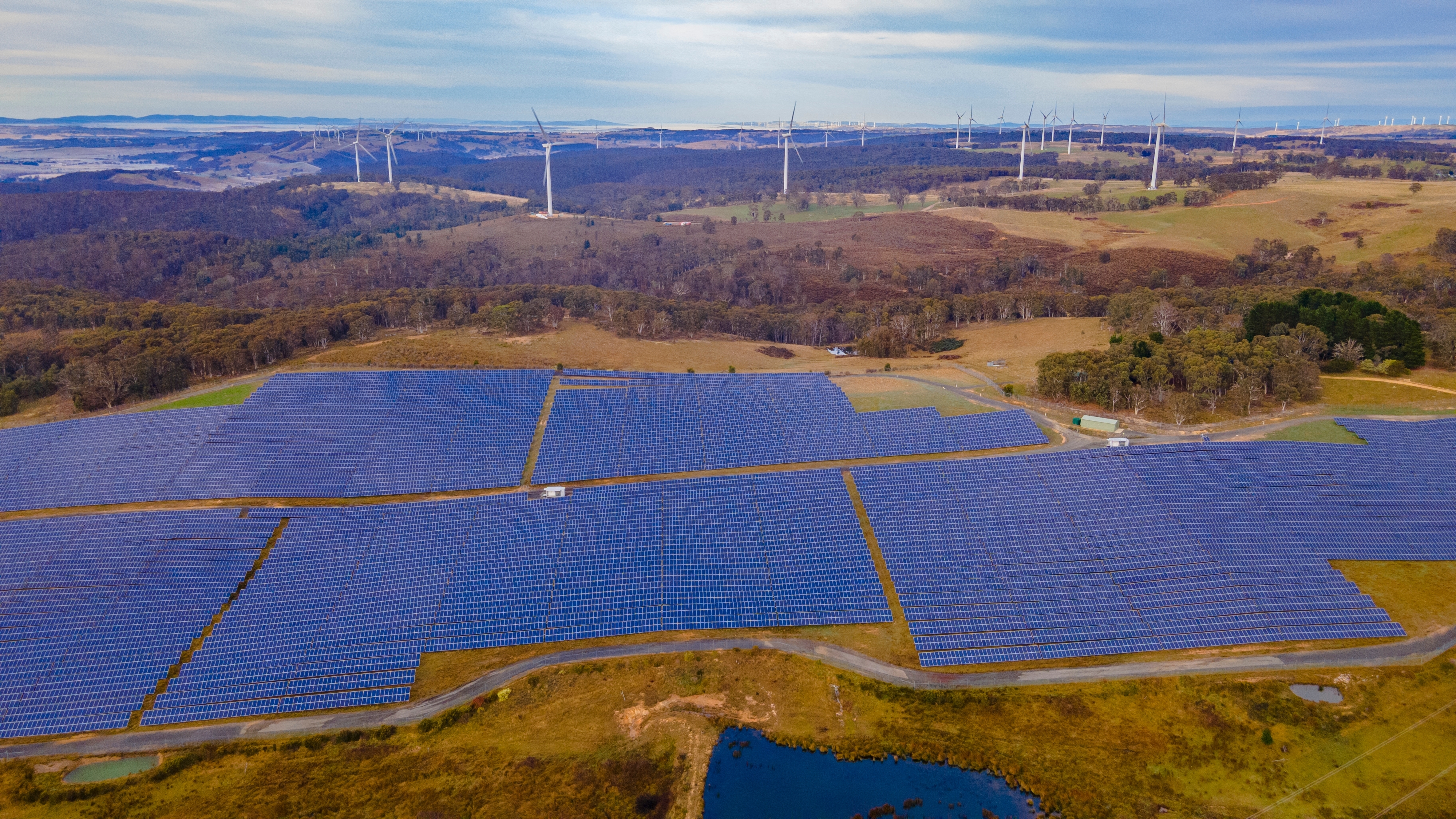 Aerial Drone View Of The Hybrid Gullen Solar Farm And Gullen Range Wind Farm For Renewable Clean Energy Supply Located At Bannister In The Upper Lachlan Shire, NSW, Australia Large