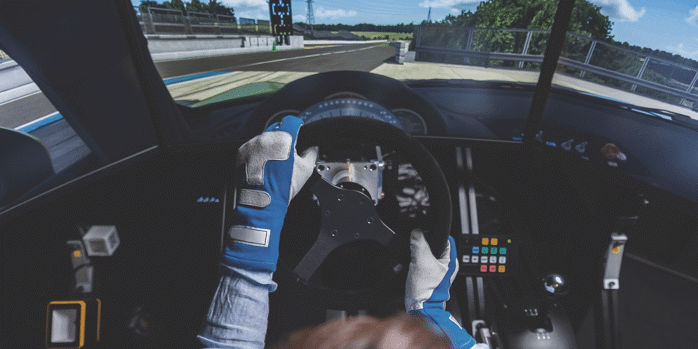 Person using a racing simulator