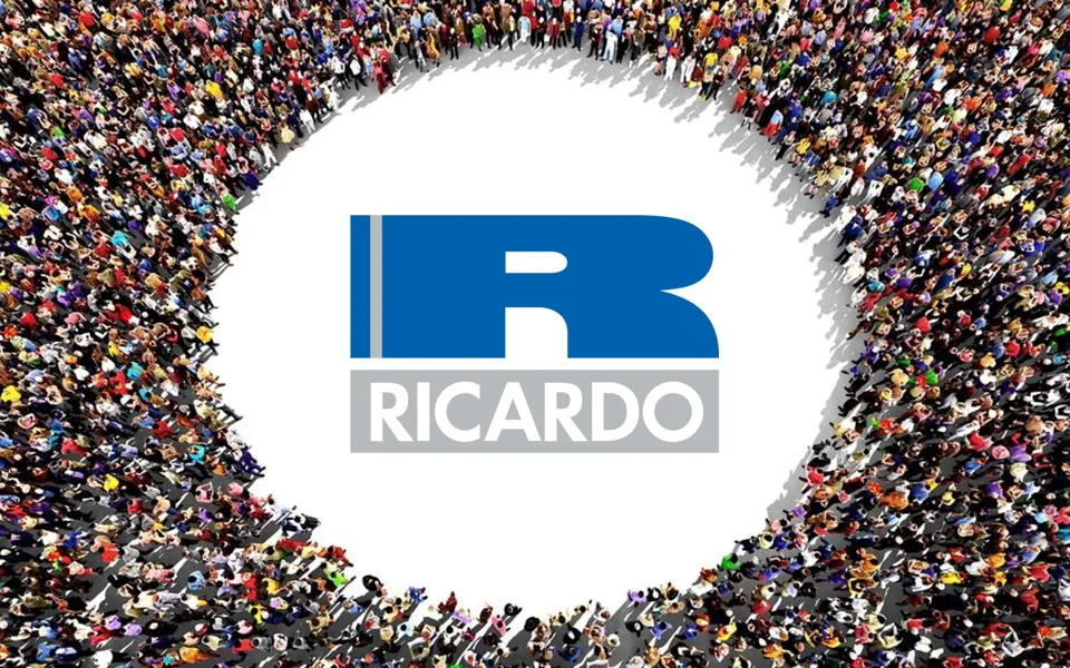 People Standing Together With Ricardo Logo In Middle