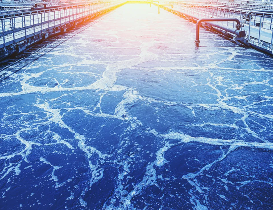 Water Treatment Tank With Wastewater, Aeration Process In Blue Color Medium