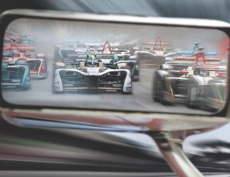 motorsports-vehicles-in-rear-view-mirror