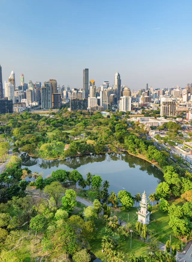 Lumphini Park And Bangkok City In Thailand