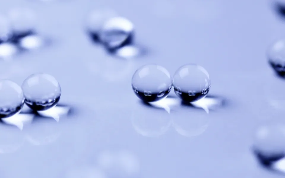 Glass Marbles On Shiny Surface